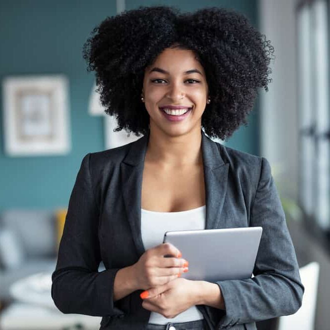 Portrait,Of,Smart,Afro,Young,Entrepreneur,Woman,Using,Her,Digital